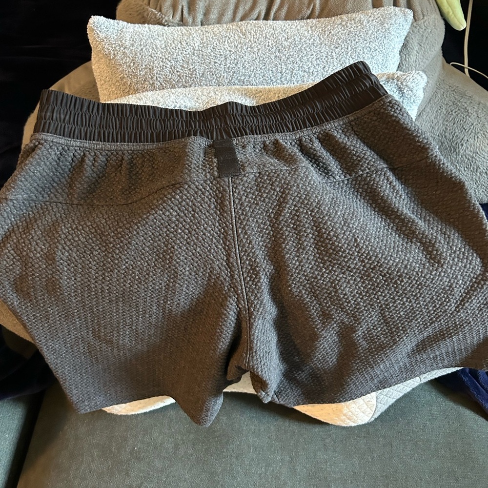 Men’s dark grey and black lulu lemon at ease shorts 7 inch inseam size MEDIUM